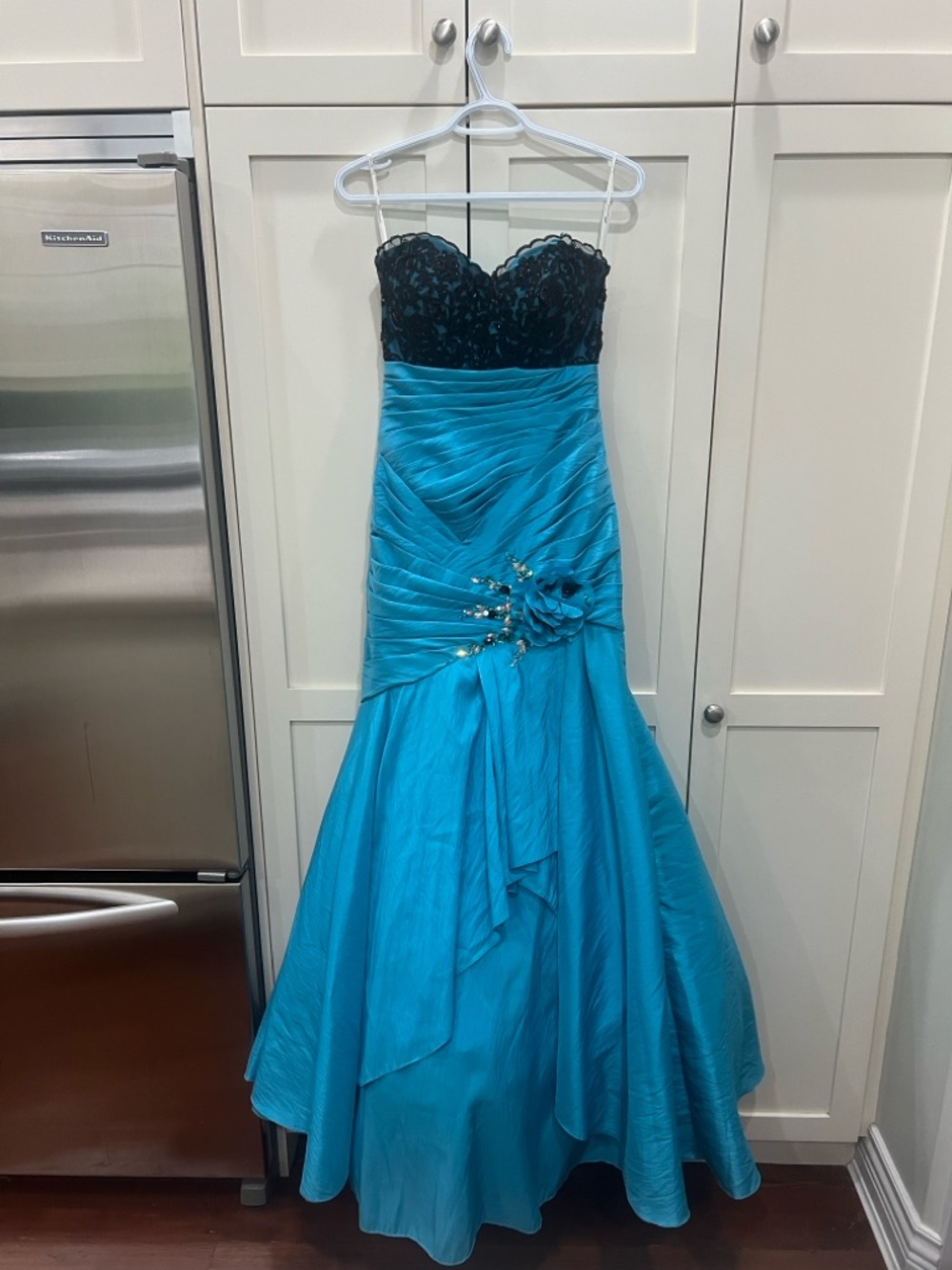 Tony Bowls turquoise prom dress